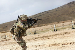 militaryarmament:  A soldier with the 10th Mountain Division firing his M4 rifle on a range in Forward Operating Base Thunder in Paktia province, Afghanistan April 12, 2014.