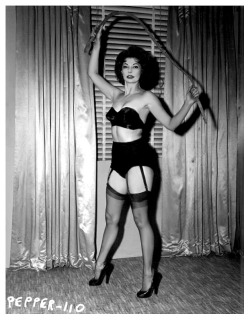  Pepper Powell would like nothing better,— than to whip you!!.. From another one of Irving Klaw’s infamous Fetish photo sets.. 