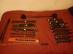 submissionandfetishism:  Mine and Little One’s collection. The collection is as follows: 7 x Collars. 4 x pairs of leather cuffs. 1 x Leg spreader bar. 2 x Leashes. 2 x Wartenberg wheels. 4 x Ball gags. 1 x Bit gag. 1 x Muzzle gag. 2 x Blindfolds. 1