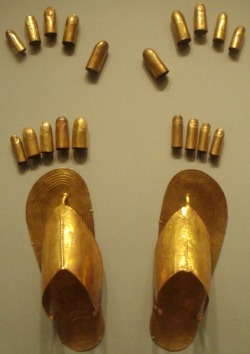 Egyptian Sheet gold finger and toe coverings, plus sandals, from the tomb of three minor wives of Thutmose III at Wady Gabbanat el-Qurud, circa 1479-1425 B.C.