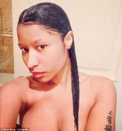 blackgfteen:  Put it away Nicki! Minaj surprises her fans as she posts a series of naked shower selfies on Instagram