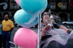 20aliens:  MEXICO. Mexico City. 2003. Cotton candy being spun at the Zocalo.Alex Webb 