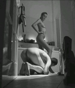 strapongirl:Superb scene…. Her control over him is total as he beg her for the waiting strapon..