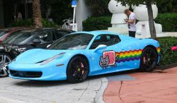 iheartchaos:  Deadmau5 gets himself a new Ferrari— a custom painted Nyan Cat Ferrari That is the internetest thing ever. More pics here