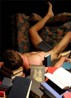 ill-fated:  wwtt:  zev:  cwb3:  The all-nighter     Tons of books, a hot guy, fun filled night! Though to be honest first thing I noticed was the book Candide by Voltaire and then the naked guy, then the rest of the books.
