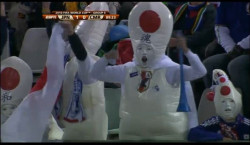 thedailywhat:  What Is This I Don’t Even of the Day: Meanwhile, in the stands during the World Cup match between Japan and Cameroon… [reddit.]  I was scared of World Cup fans, but clearly the scariest of them all is Japanese World Cup fans.