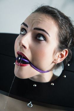 Bound women&hellip; I basically concur with the quoted text below. However, I&rsquo;d like to be more specific about what I like about this picture. The look in her eyes is great, but the real power of this image is the fact that her lipstick is perfect b