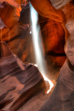 argoshots:  Light falls to the floor of Antelope Slot Canyon, Navajo Nation near Page, Arizona USA. 