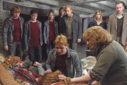  Mr Weasley dropped to his knees beside George. For the first time since Harry had known him, Fred seemed to be lost for words. He gaped over the back of the sofa at his twin’s wound as if he could not believe what he was seeing. Perhaps roused by the