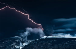 bitchville:  The Dark Lord of Mount Doom - Volcano Eyjafjallajökull on the 13.th of  mai. Thunders and lightnings striking through the black ash moody sky  above the erupting crater. Steam rising from the glacier Gígjökull while  1000°C hot lava bursts