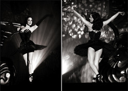suicideblonde:  Dita von Teese performing The Black Swan in 2007, photographed by Dustin Rabin Tightly laced into a sleek black feather corset and  Swarovski-embellished tutu, Dita puts a burlesque twist on the seductive  “Odile” of Swan Lake! After