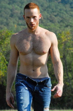 Outdoor ginger in jeans.