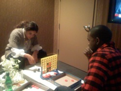   Beyonce and Kanye playing Connect Four