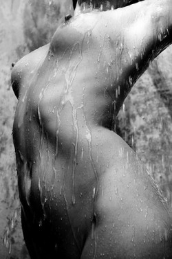 This is one helluva sexy erotic photo!  The model’s (she HAS to be a model) body is smoking hot and just check out those super firm tits and big erect nipples - so fucking hot!  She looks like she’s in some outside shower as well which I would have