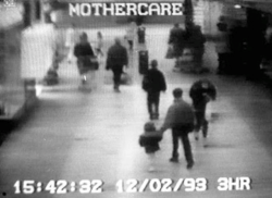James Bulger (2), captured on CCTV in New Strand Shopping Centre, Bootle, being led away from his mother by Jon Venables and Robert Thompson (both 10). James was taken on a 2.5 mile walk across Liverpool past 38 confirmed eyewitnesses as he cried for
