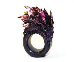 amyho:   Maud Traon’s conceptual (and delightfully impractical) jewellery draws inspiration from world issues, from consumerism to natural disasters and plane crashes. Combining materials such as fimo clay, glitter and electroformed copper with found