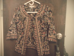 I got this awesome jacket at a local vintage store. It fit my small frame PERFECTLY.  Envy me. (Taken with picplz.)
