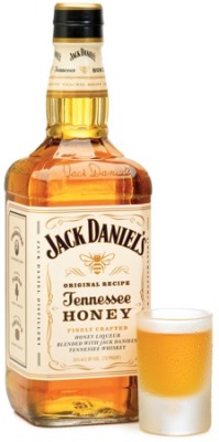 bbook:  The mere mention of Jack Daniel’s brings certain images to mind, all of them strong and manly: Bikers, bar brawlers, wizened old farmers shooting beer cans off a tree stump. By ordering a Jack on the rocks at some Manhattan bar, I feel like