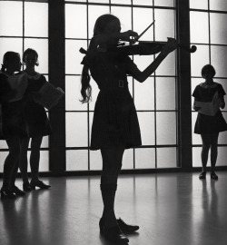 Violinist rehearsing at the Methodist Ladies’ College in Burwood, Sydney photo by Max Dupain, 1971