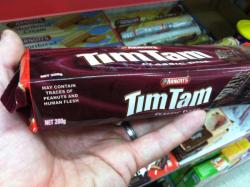 inkarnadyne:  hipster-robin:  Pretty much the only way I ship Tim/Tam.  WHOA. WAIT.  MAY CONTAIN TRACES OF PEANUTS  AND HUMAN FLESH.  