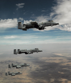 Soaring over Arizona 355th A-10 Thunderbolt IIs in formation over Arizona; photo by Alesia Goosic, 2005