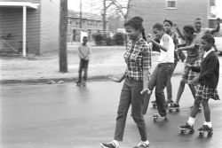 coolchicksfromhistory:   Group of girls skating in the street in front of a public housing project on Smythe Curve in Montgomery, Alabama, during Christmas vacation, January 1966. Each day of the Christmas holiday, the city of Montgomery closed over forty