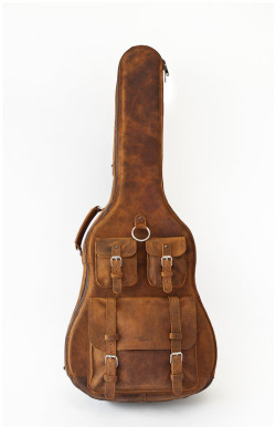 finefinds:  Whipping Post Leather Guitar Case Link The day I get myself a Lowden, Mcpherson, or a 59’ Sunburst - I’d buy this case immediately. Right now, my humble stable of guitars is content with Levy’s.  Whoa.