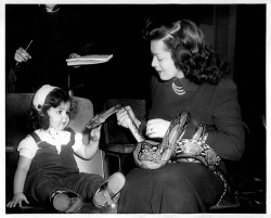 burleskateer:  In February 1949, Zorita sits in a NYC courtroom with her 10-foot rock python, and her 20 month-old daughter: “Tawny”.. She’d been arrested with ‘Cruelty To Animals’ by New York’s ASPCA; claiming Zorita taped the extremities