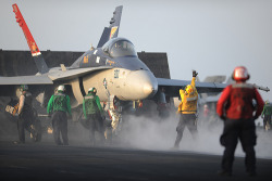 youlikeairplanestoo:  Always thought F-18s (any Navy/Marine Corp aircraft) look especially mean when they’re moments before launching from the deck of a carrier. This Marine Corp F/A-18C is no exception, awesome frame. ARABIAN SEA (Aug. 2, 2011) Sailors
