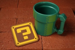 populationgo:  Super Mario Bros. Warp Pipe Mug Start your day with a cup of Joe, nay, a cup of Mario with this fancy Warp Pipe Mug brought to you by Fangamer. This retro, 8-bit styled mug comes coupled with an appropriate, random “block” coaster (one