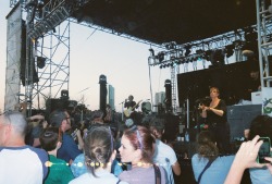 spittinggames:  Picture I took with a disposable of Bright Eyes playing in Austin at SXSW.  We were so close to eachother. 