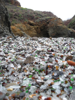 smcoolbeans:  Glass Beach During the early 20th century residents of Fort Bragg, California chose to dispose of their waste by hurling it off the cliffs above a beach. No object was too toxic or too large as household appliances, automobiles, and all