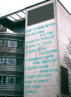 taumazo:  How to Work Better mural is by Swiss artists  Fischli &amp; Weiss and covers an office  building in Zurich-Oerlikon.  You can prominently see it from the train  when you get into Zurich  station. 