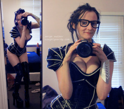 naughtynerdy:  A mirror snapshot of my tron inspired outfit. The paneling glows blue after being under UV for a while, it’s rad! Pity about the bedhead hair but I had to put it on as soon as the package arrived! 