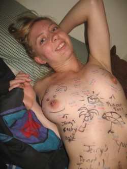 girlswithsigns:  another girl completely covered in boy graffiti, with a super happy nipple :) also, notice the â€œpaidâ€ stamps, and it looks like this was done by â€œJerryâ€, lol 