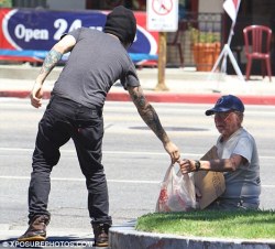      Pete Wentz taking food from a homeless man and then laughing about it  He didn’t take it from him,the bottom photo should be on top,he was being a good person and giving that man that bag of food.  no he stole it  Wow, seriously? Go search it up.