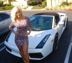 malibudolly:  I need to have this car.  So Malibudolly likes the car. What car? I can&rsquo;t get beyond Â how that tight little dress wraps around her tight little body. Good Lord, this girl needs to get famous. Nice Job Baby!!!