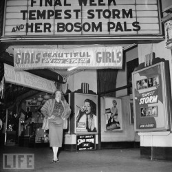 whentheroadrunsout:   Tempest Storm poses for a photo beneath the marquee of the &lsquo;New Follies Theatre&rsquo;; located in Los Angeles, California.. 