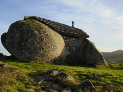 lsdemon:  interplanetarylove:  architizer:  A house in Fafe, Portugal. Click through for more Porutguese boulder architecture!  this rocks  ^ 