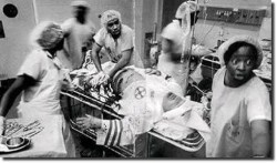 neptunespresenttheclones:  high-rollin:  duchesssx:  desertmanian:   African American doctors attempting to save the life of a Klu Klux Klan member: This photo left me speechless, this is what respect is.   this is what grace is  oh….shit..  wow…