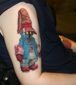 fuckyeahtattoos:  I got this tattoo from Eric Easterday @mos eisley on division in grand rapids, michigan.  I got it because I was obsessed with orko from the he-man cartoon.  Then when Final Fantasy 9 came out I was super excited to play it because of