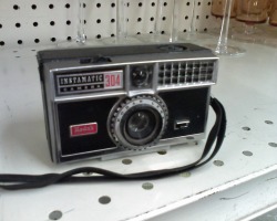 heck-yeah-old-tech:  heck-yeah-old-tech:  Kodak Instamatic 304 at a thriftstore.  This camera was the first to use FlashCubes, and takes 126 film so it’s more a shelf piece than something you’d actually be able to go shooting with today.  I saw an