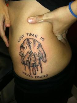 fuckyeahtattoos:  “Lost time is never found”.