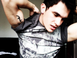 Not only is he adorable, but he has the tattoo