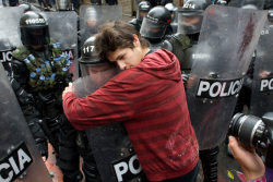Tvface:  Galosengen:  Barrymanilowswinternightmare:   A Demonstrator Embraces A Riot
