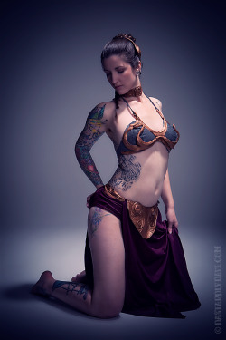 theesylvia:  tattooed slave leia shot by @dastardly_dave #starwars dastardlydave:  @TheeSylvia in the authentic Princess Leia Slave Girl costume. Now if that doesn’t put some hum in your light saber…. you have completely lost touch with the force.