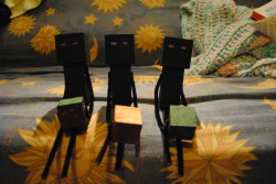 drvalkyrie:  So remember how I made a little Enderman a while back? Would you like one of your own? I have three here I just made today (their eyes need to be repainted so photos are not exactly accurate). There are only 3 right now. One holding a Wood