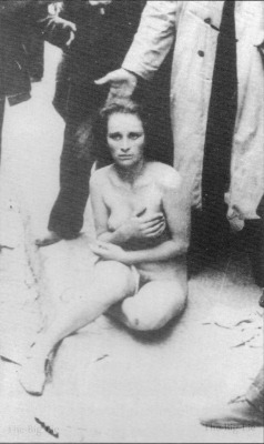 The details of this photograph, which was probably snapped in Lvov, Ukraine, are in doubt.  Some sources claim the woman is a captured British agent.  Others insist she is a Jew who fell into the hands of antisemitic Ukrainians,  Whatever the story