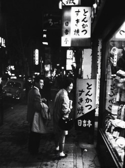 Legrandcirque:  A Young Couple Window Shopping In The Ginza Area. Photograph By John