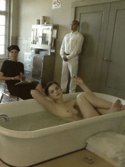 I love everything about this. The nude smoking female, so blase in a bath. The stoic black-clothed nurse with a book. The security man. EVERYTHING.